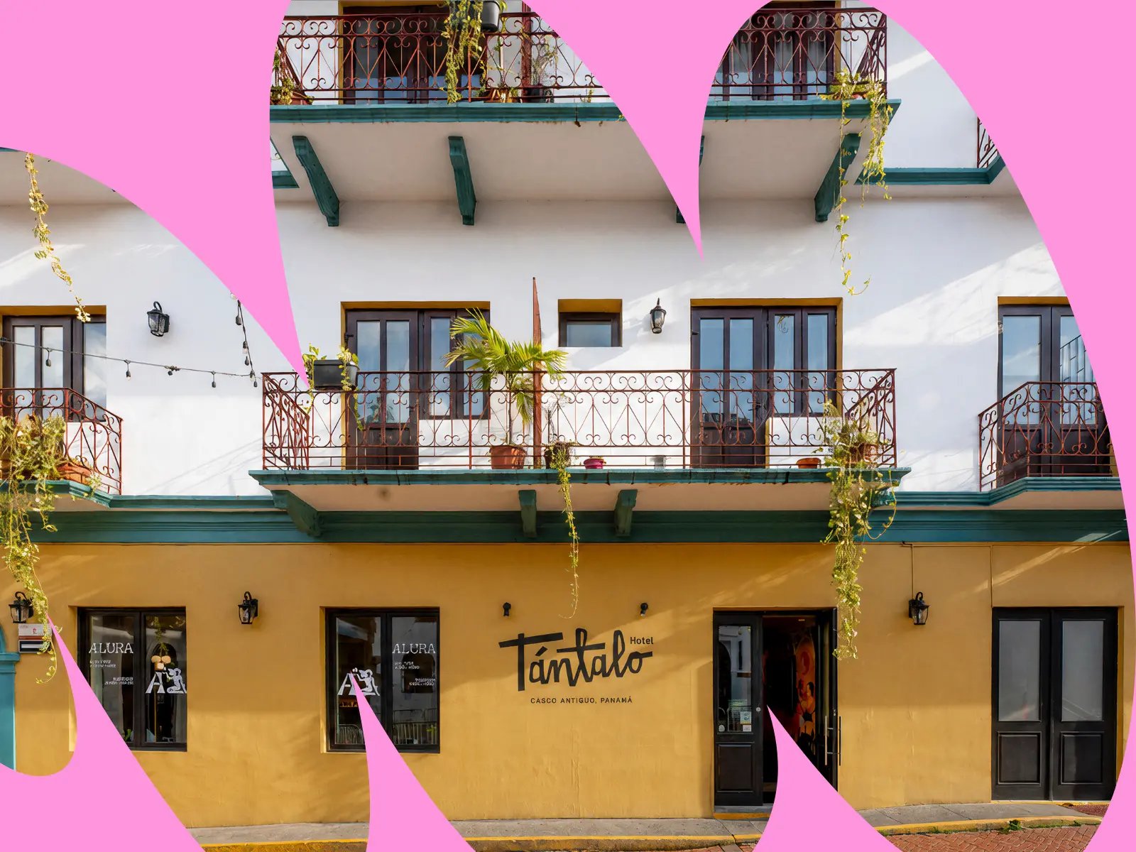 Facade of Tántalo Hotel in Casco Viejo with brand graphics