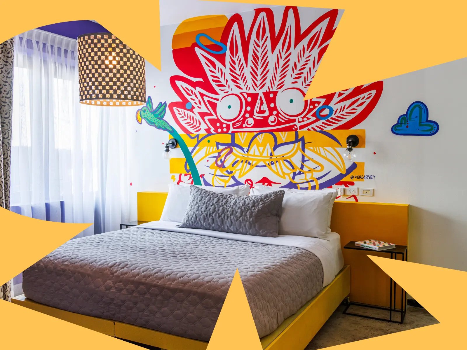 Room with artist mural and brand graphics at Tántalo Hotel, Casco Viejo